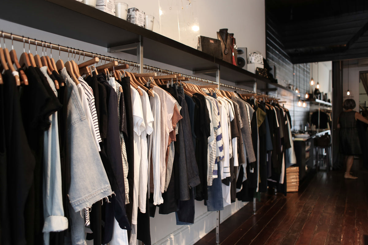 clothing store with a rack of clothing